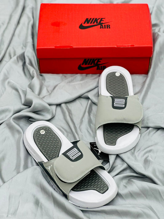 Nike Jordan 4 Slides in Grey Color